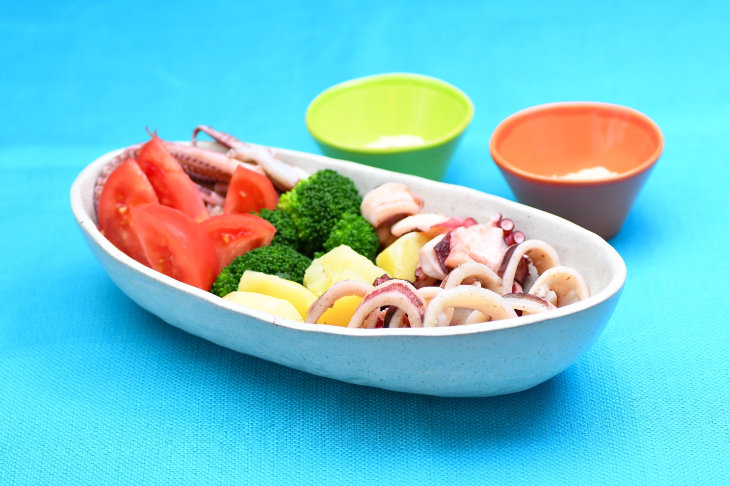 魚介と初夏野菜の蒸し煮こめ油アイヨリソース